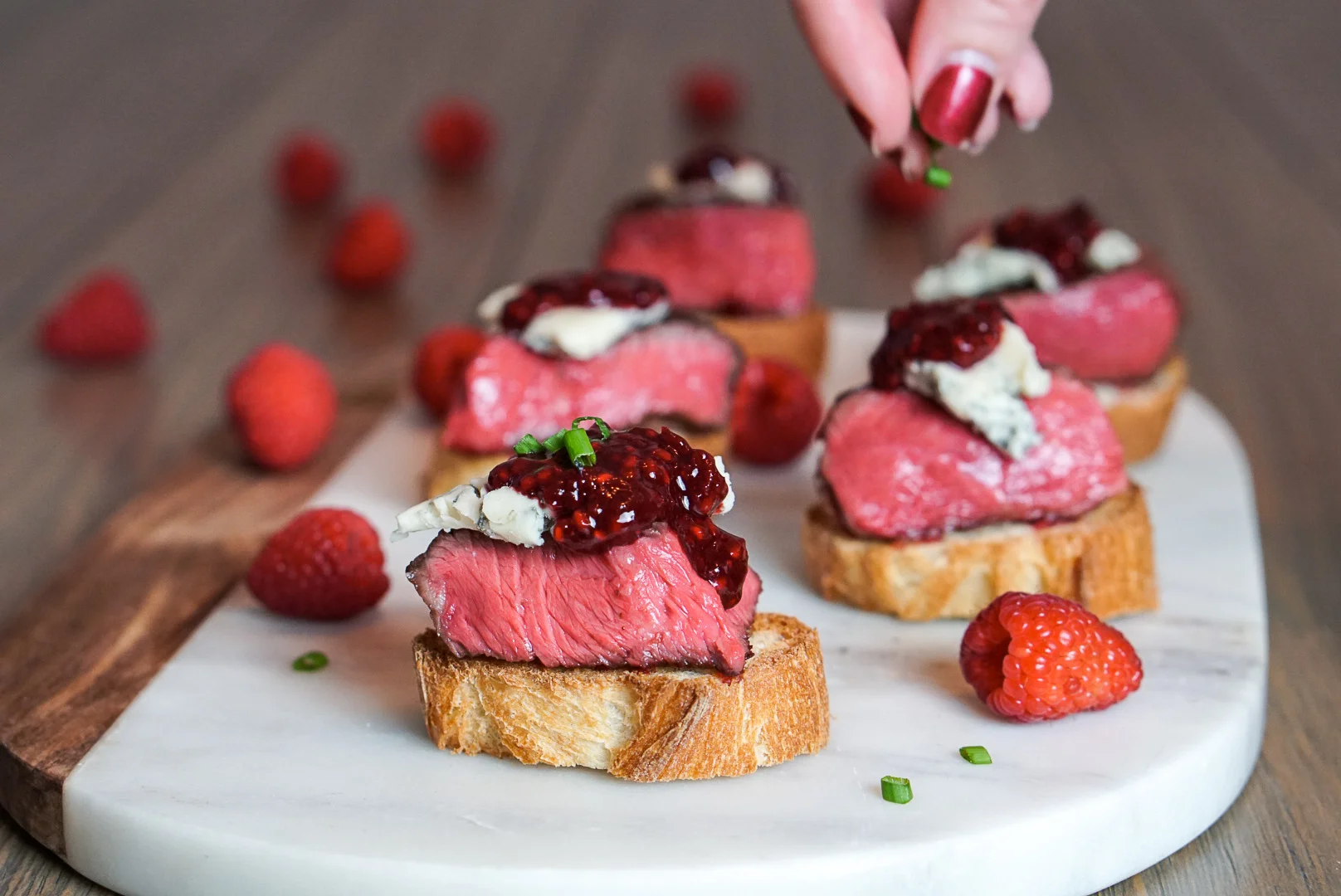 Steak Bites with Blue Cheese and a Raspberry Balsamic Sauce Couple in
